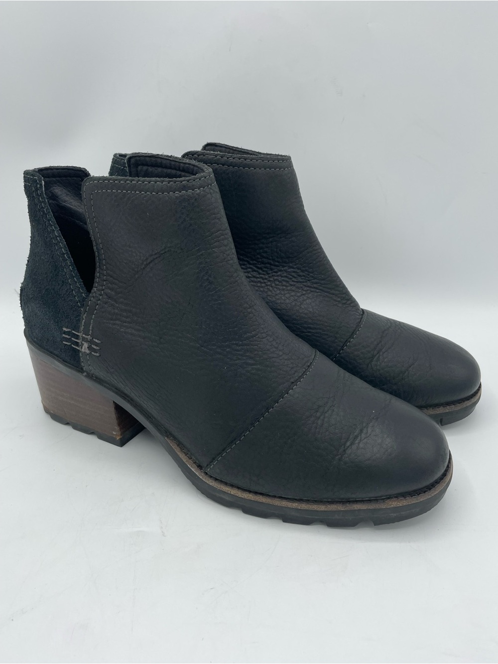 Sorel Cate Cut Out Black Leather Ankle Booties with Stacked Heel.